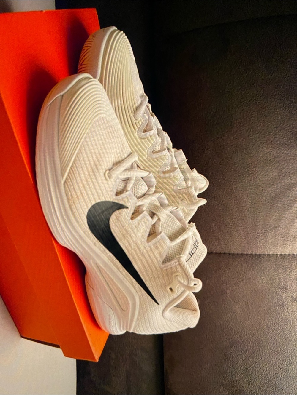 Nike Women’s Off-White Sneakers with Black Swoosh